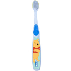 Cushioned brush head protecting tender gums