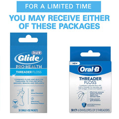 Threader floss being used to clean between teeth with braces