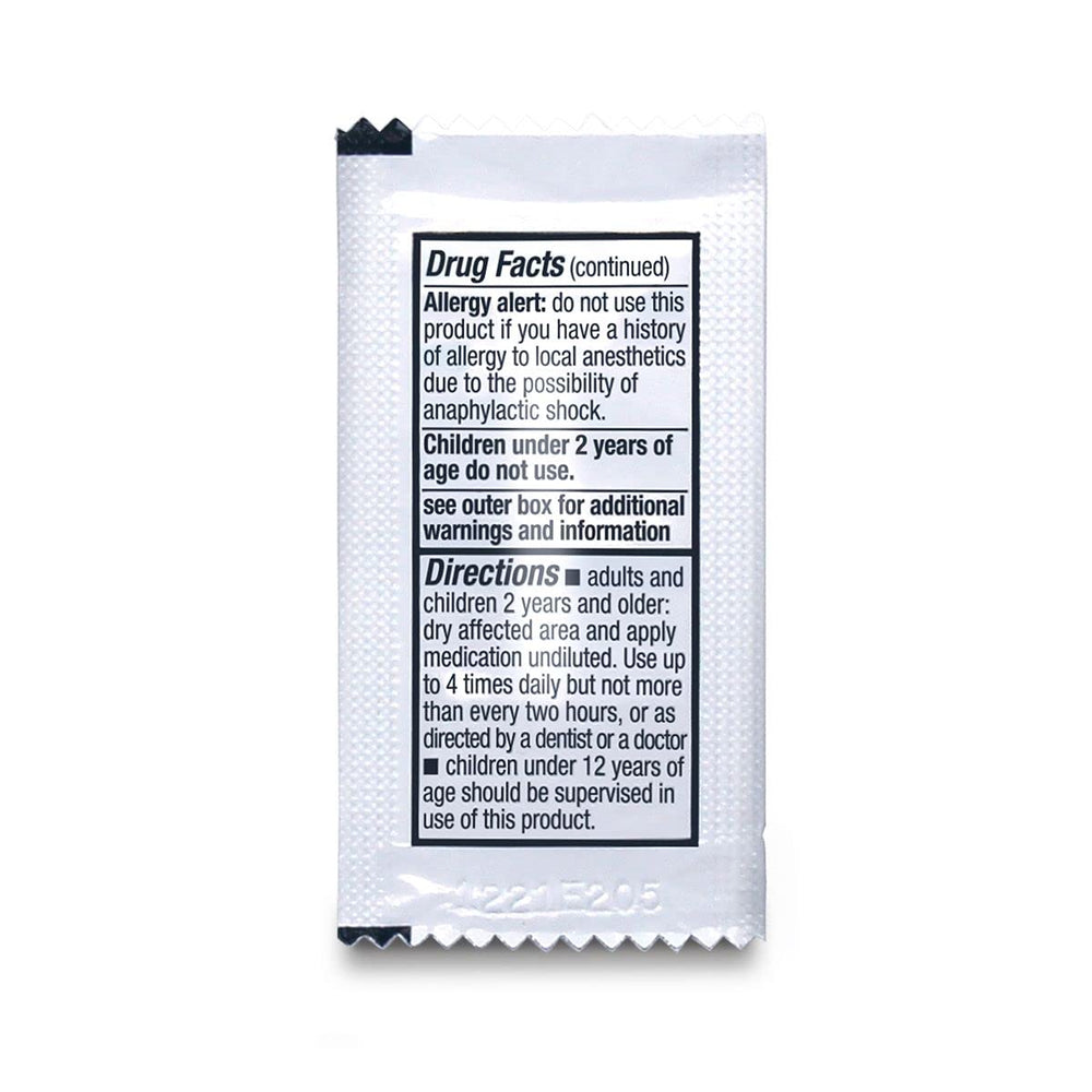 Oral Pain Relief box placed in a first aid kit