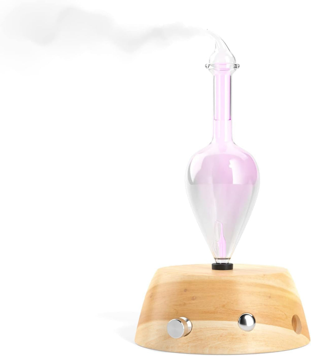 Organic Aromas Elegance diffuser glass-nebulizer closeup highlighting no-water design for pure aroma.