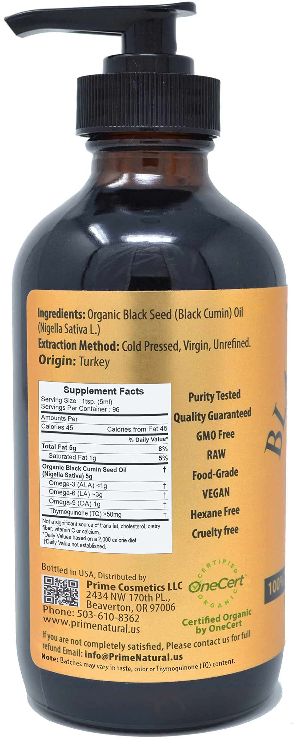 Liquid black seed oil (Nigella sativa) in glass bottle