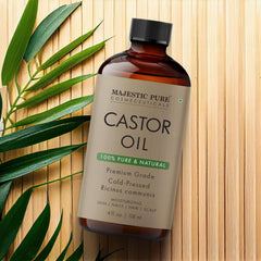 Castor oil applied to hair and eyelashes for nourishing effect