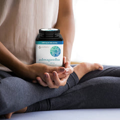 Close-up of Ashwagandha capsules and bottle with 1000mg per serving