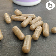 One lavender capsule with water illustrating easy swallowing