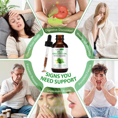 Oregano oil drops being mixed with water
