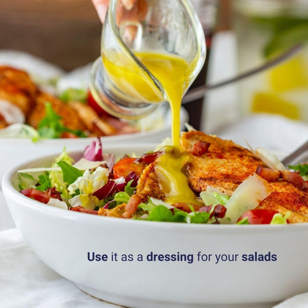 Sacha Inchi Oil being poured over salad
