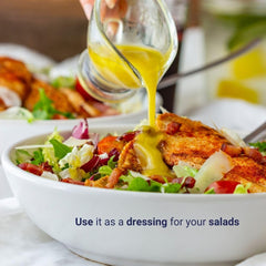 Sacha Inchi Oil being poured over salad