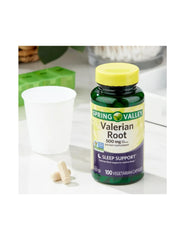 Organic valerian root powder and extract on spoon