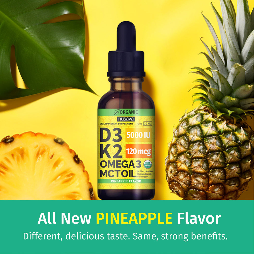 Close-up of dropper dispensing Vitamin D3 K2 liquid