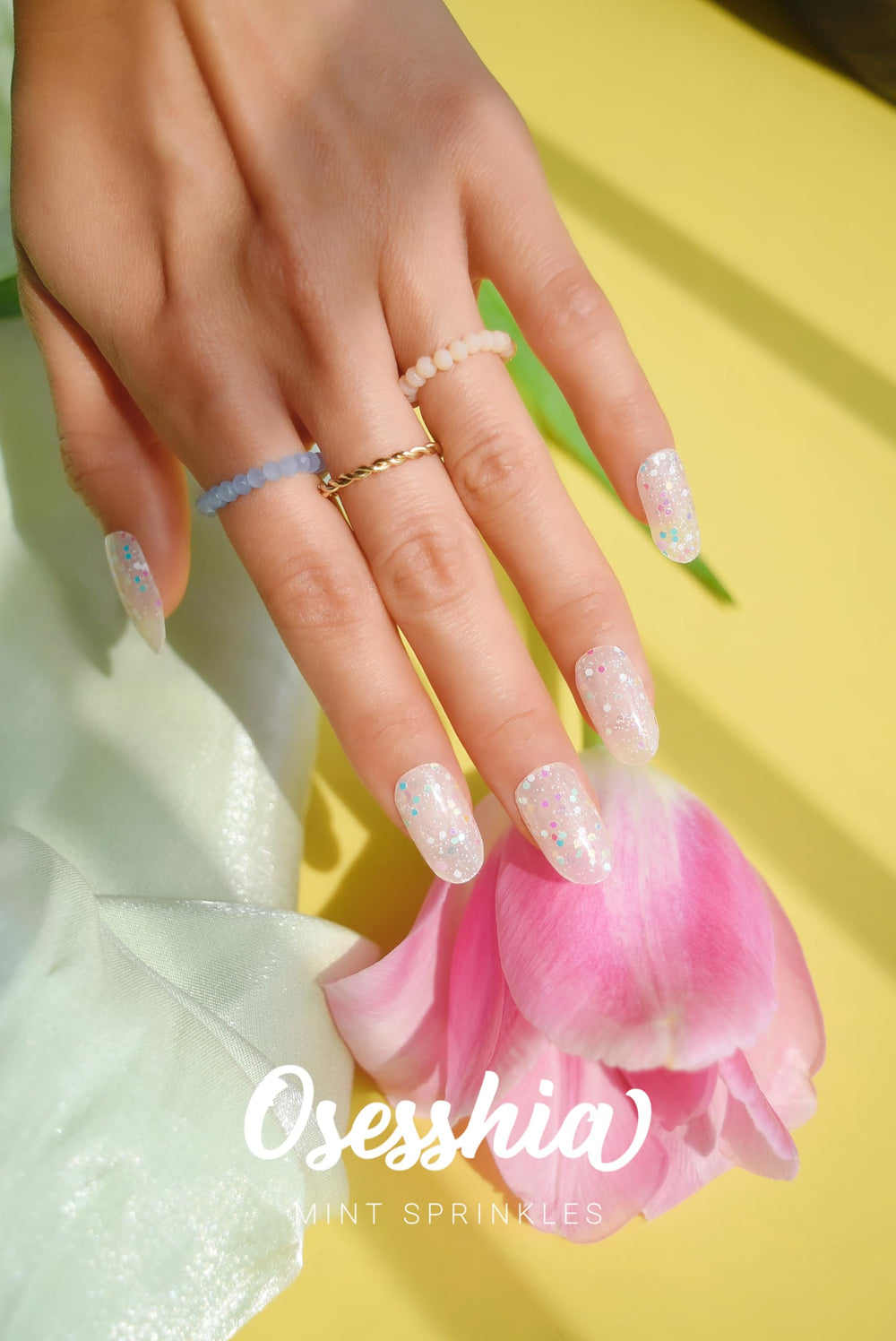 Mint Sprinkles Osesshia strips ready for quick salon-inspired nails at home
