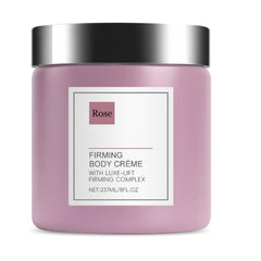 OUKPANE Champagne Lift Body Creme bottle close-up showing luxurious firming action for visibly firmer skin.