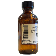 Diffuser oil bottle with Lilac scent on a decorative background