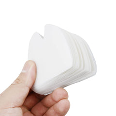 White denture adhesive cushions for upper denture