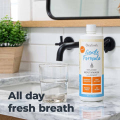 Oxyfresh mouthwash bottle next to a USA-made seal