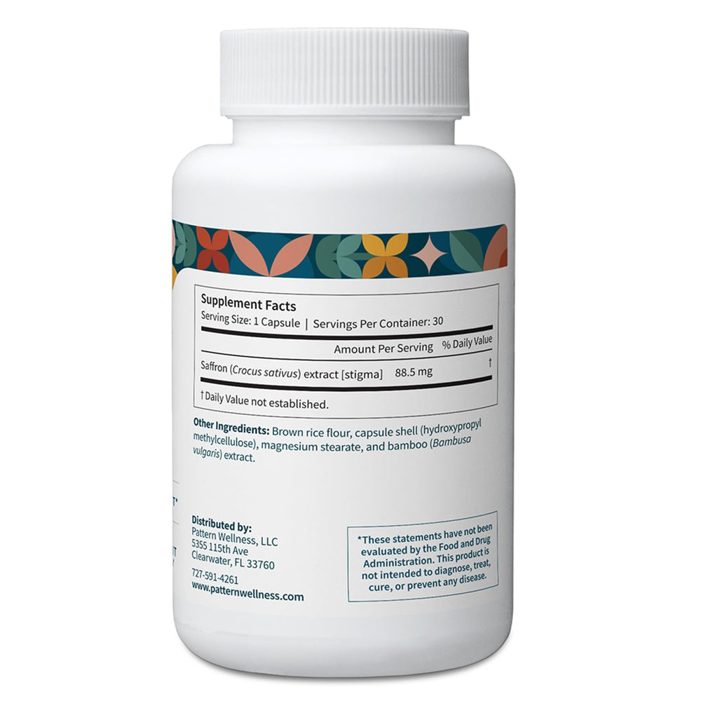 Close-up of saffron stigma powder in supplement bottle