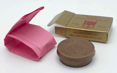 Pau Yuen Tong Old Chinese Balm jar foregrounds traditional balm texture for soothing routines.