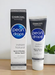 Pearl Drops toothpaste on white background with branding