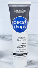 Lifestyle banner with Pearl Drops branding and charcoal imagery