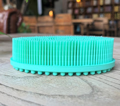 Penepico two-in-one bath and shampoo brush aids mess-free cleansing and scalp massage