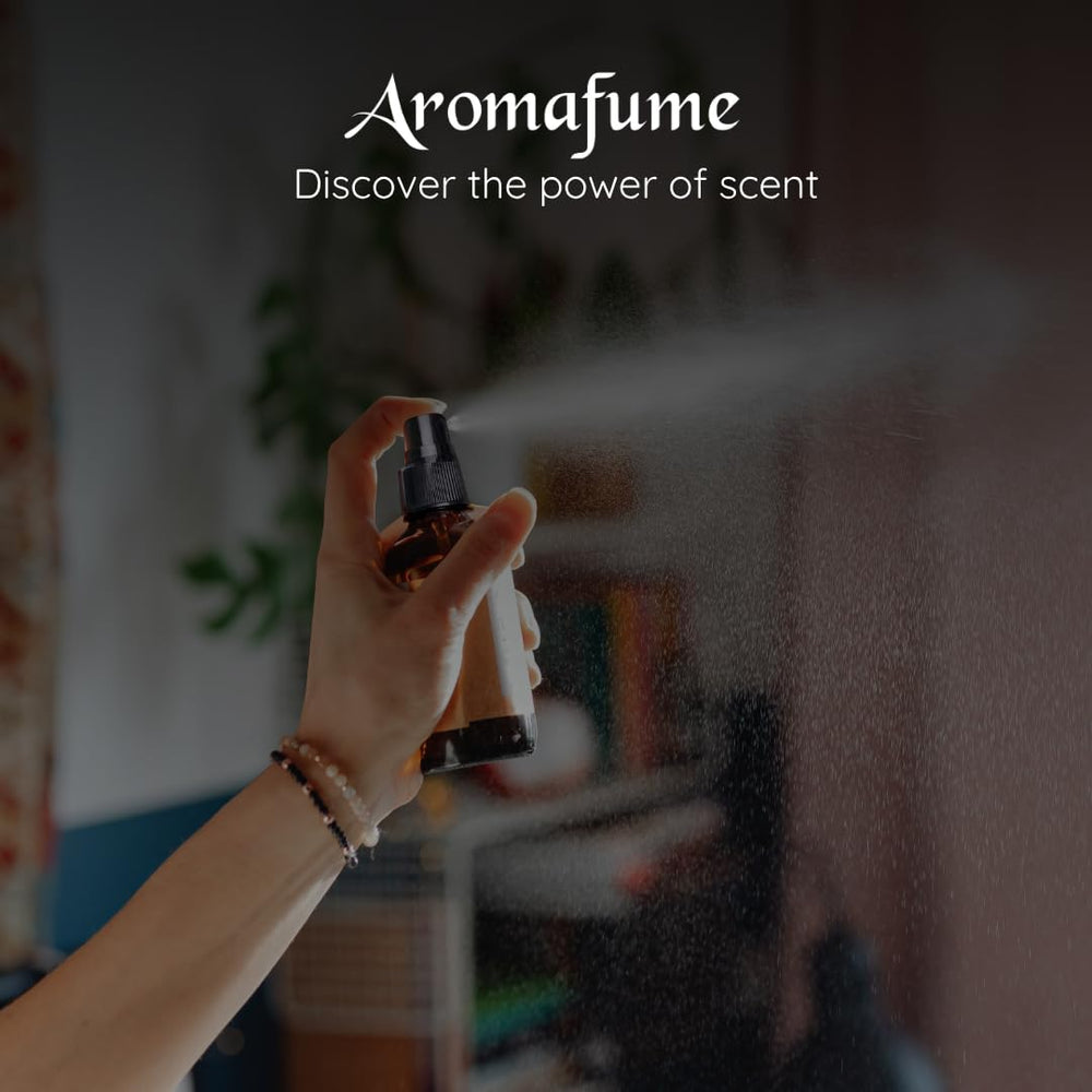 Lifestyle scene with spray bottle on bed and mint decor