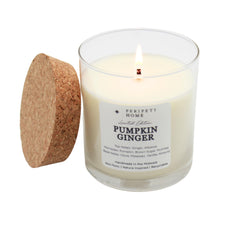 PeripetiHome pumpkin-ginger candle jar glowing to create warm fall ambience.