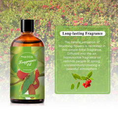 Honeysuckle fragrance oil bottle beside a diffuser