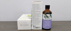 Close-up of PHATOIL rosemary essential oil packaging and label