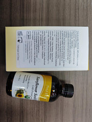 Applying sunflower oil to skin for moisturizing