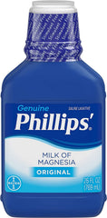 Phillips' Milk of Magnesia Original bottle pouring for gentle overnight relief.