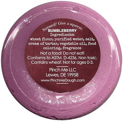 Person relaxing with Pinch Me Therapy Dough Bumbleberry scent
