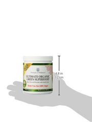 Pinnacle of Wellness Berry Green Superfood Powder with glass of berry drink