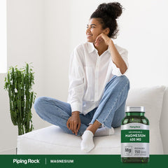 Piping Rock softgel in hand demonstrating easy-swallow size and convenience benefit