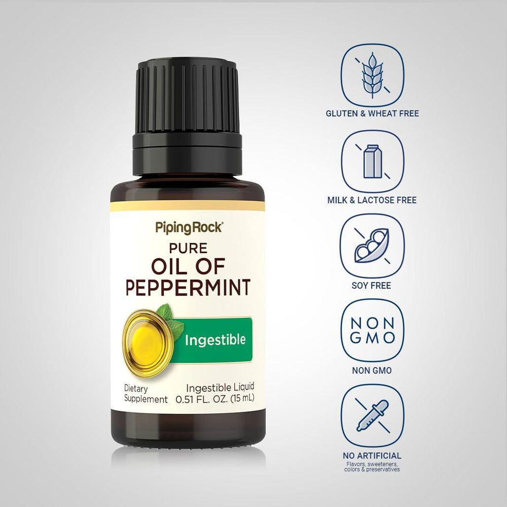 Piping Rock peppermint oil 15 ml bottle in hand to show compact size and portability