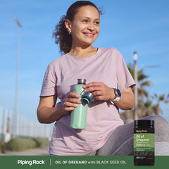 Piping Rock bottle in hand for size comparison and travel portability