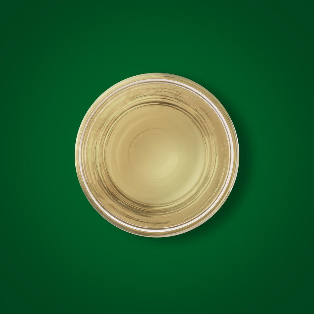 Close-up of amber bottle label and cap, emphasizing Piping Rock tested-quality branding