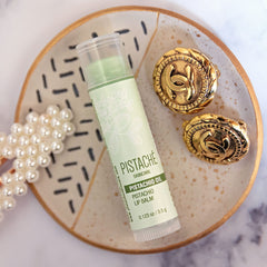Pistaché Skincare Lip Balm packaging close-up highlighting clean formula