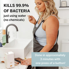 Pixie Cup steam cleaner button in use demonstrating a simple one-press cycle