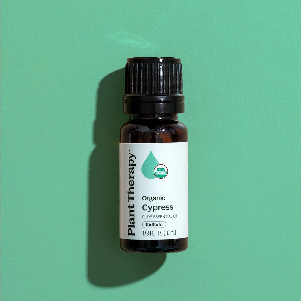 Cypress essential oil bottle with packaging