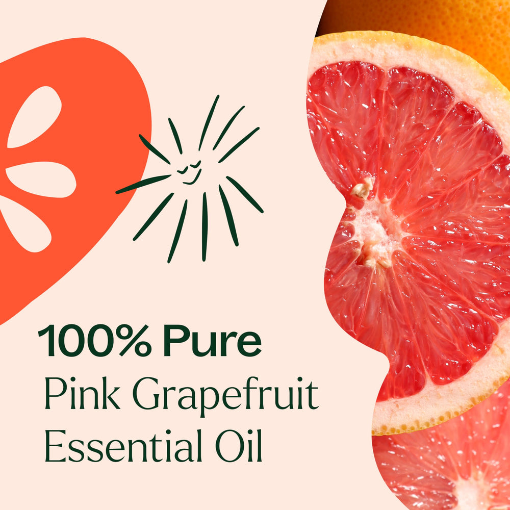 Aromatherapy setup with diffuser and grapefruit oil bottle