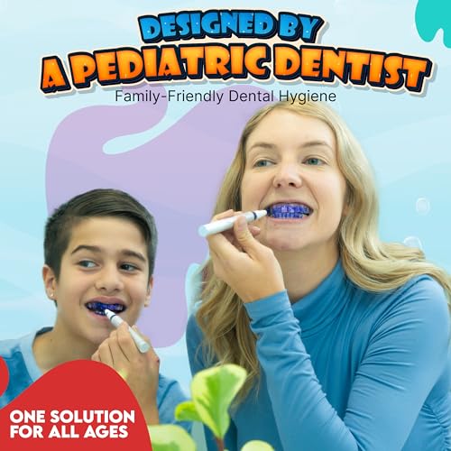 Applying PLQUE gel to teeth to reveal plaque