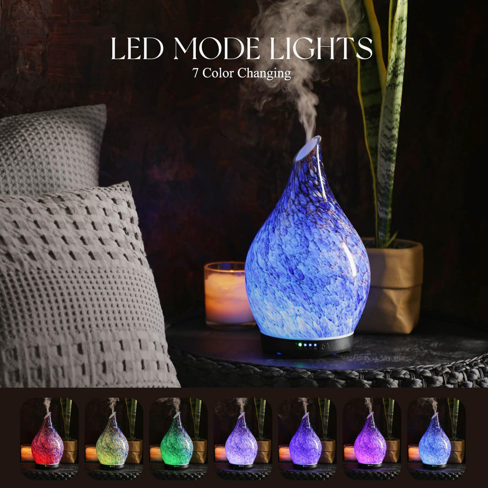 Diffuser emitting color-changing LED lights in Deep Blue