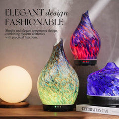 Ultrasonic diffuser releasing a cool mist with LED lighting