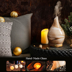 Hand-blown glass globe and wooden base of the Porseme diffuser