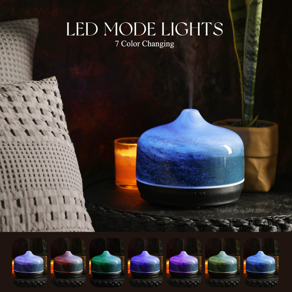 Star-shaped glass cover and wood grain base of Porseme diffuser