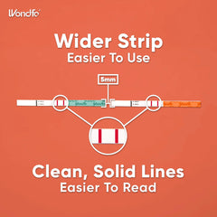 Close-up of LH and hCG test strips showing results