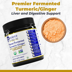 Close-up of turmeric and ginger powder scoop