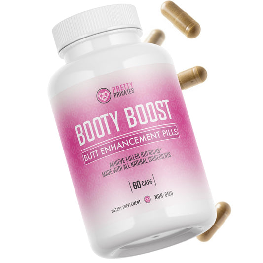 Premium butt enhancer pills bottle on white background