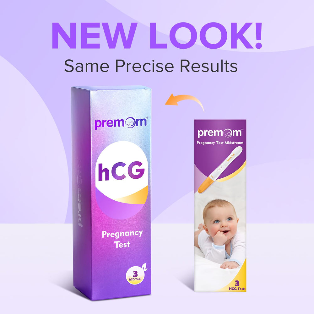 Dip-in midstream pregnancy test held over urine sample