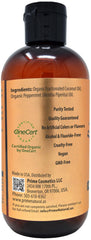 Close-up of organic coconut and peppermint oil ingredients for oil pulling