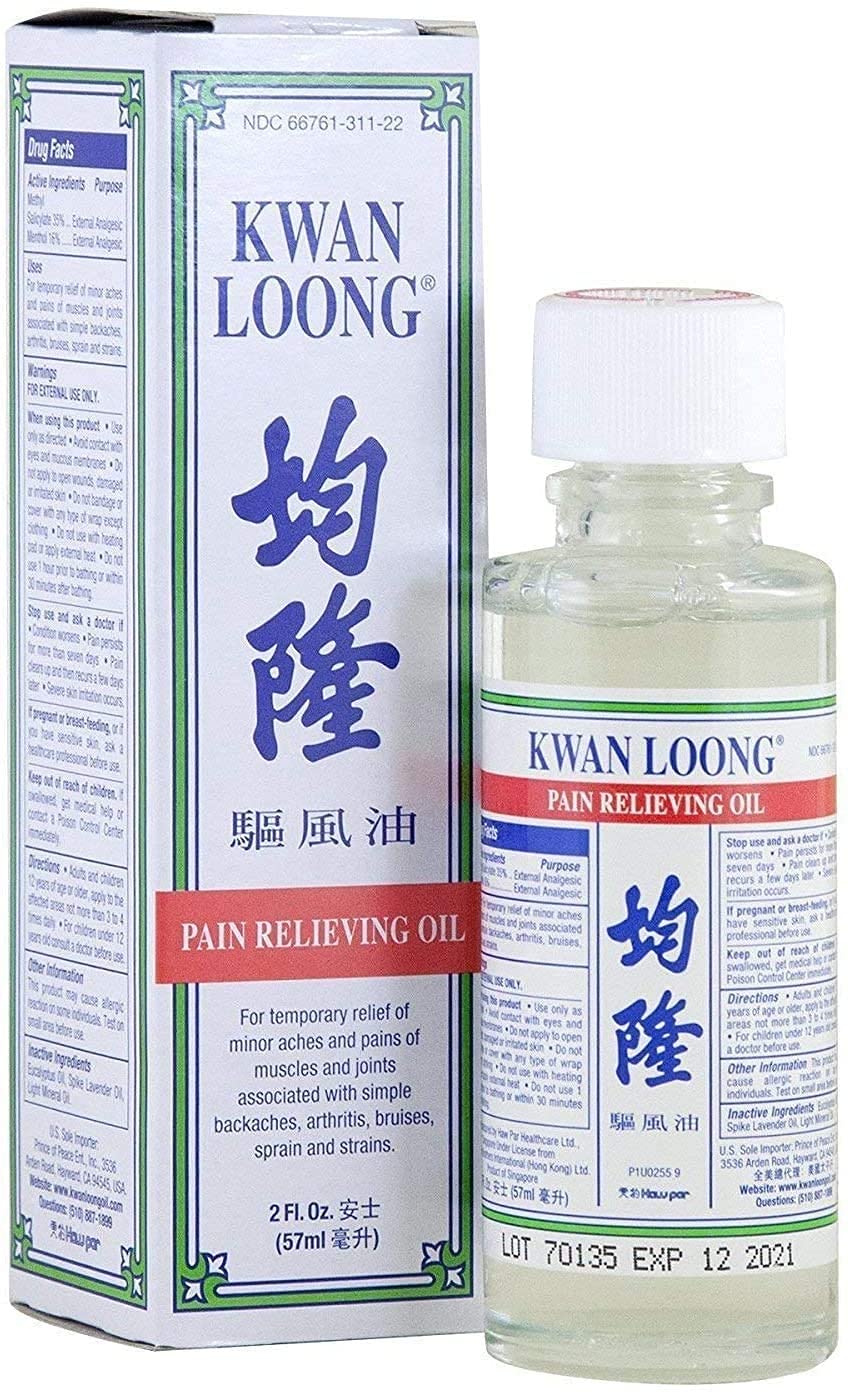 Prince of Peace Kwan Loong oil application demonstrates soothing topical relief.